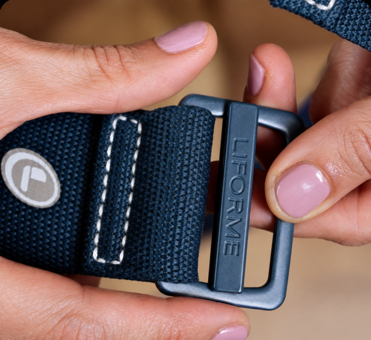A close-up of the Liforme Magic Galaxy Yoga Strap Dusk Blue featuring the LoopForMe™ Guidance system and a matching alloy buckle.