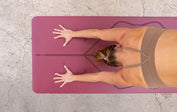 Downward Facing Dog for shoulder pain on a Maroon Liforme Yoga Mat 