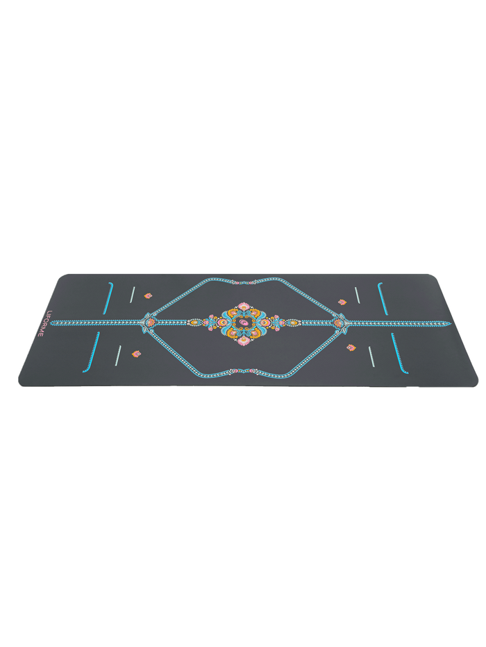 Low-angle horizontal view of the non-slip Liforme Mindful Garden Yoga Mat highlighting its slim profile and grip.