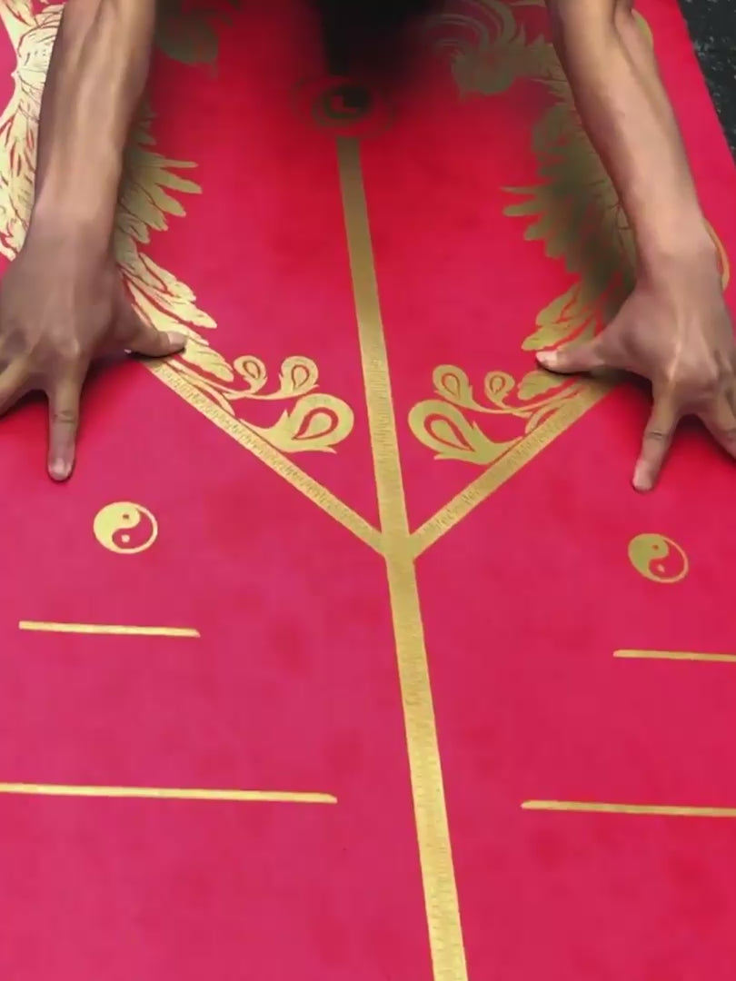 A video of a man practicing yoga on a Liforme Phoenix Yoga Mat 
